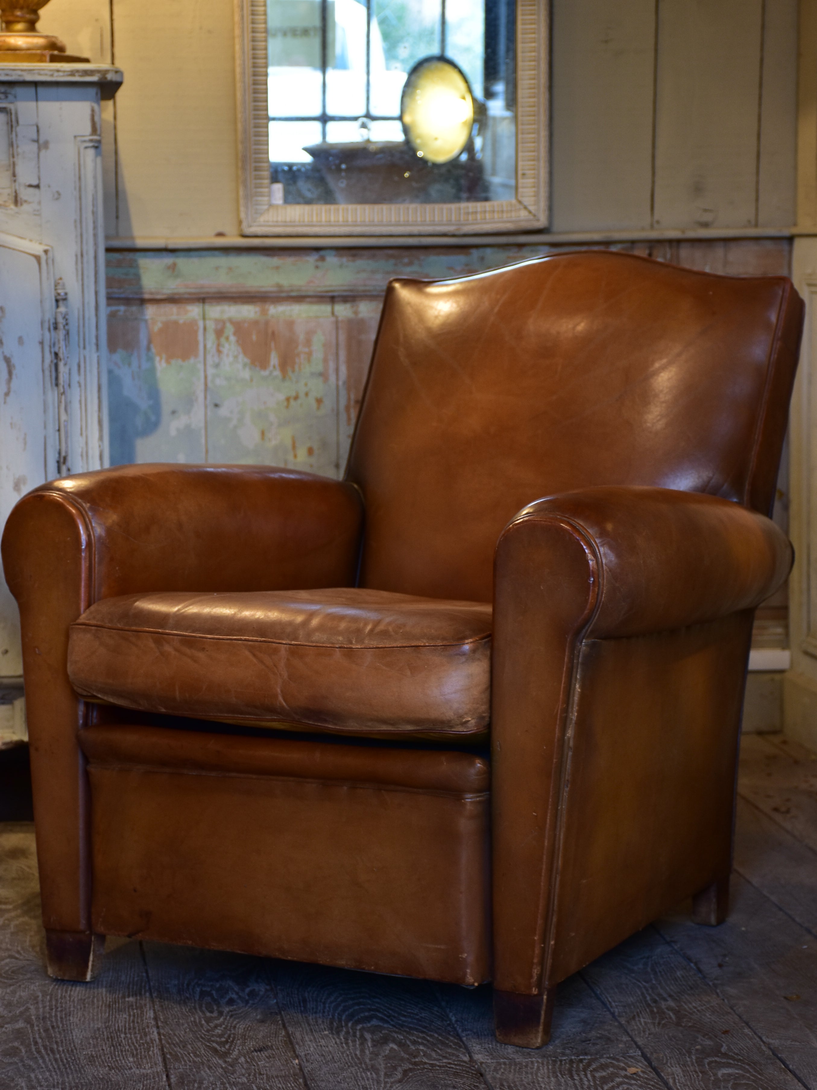 Vintage French leather club chair in original condition