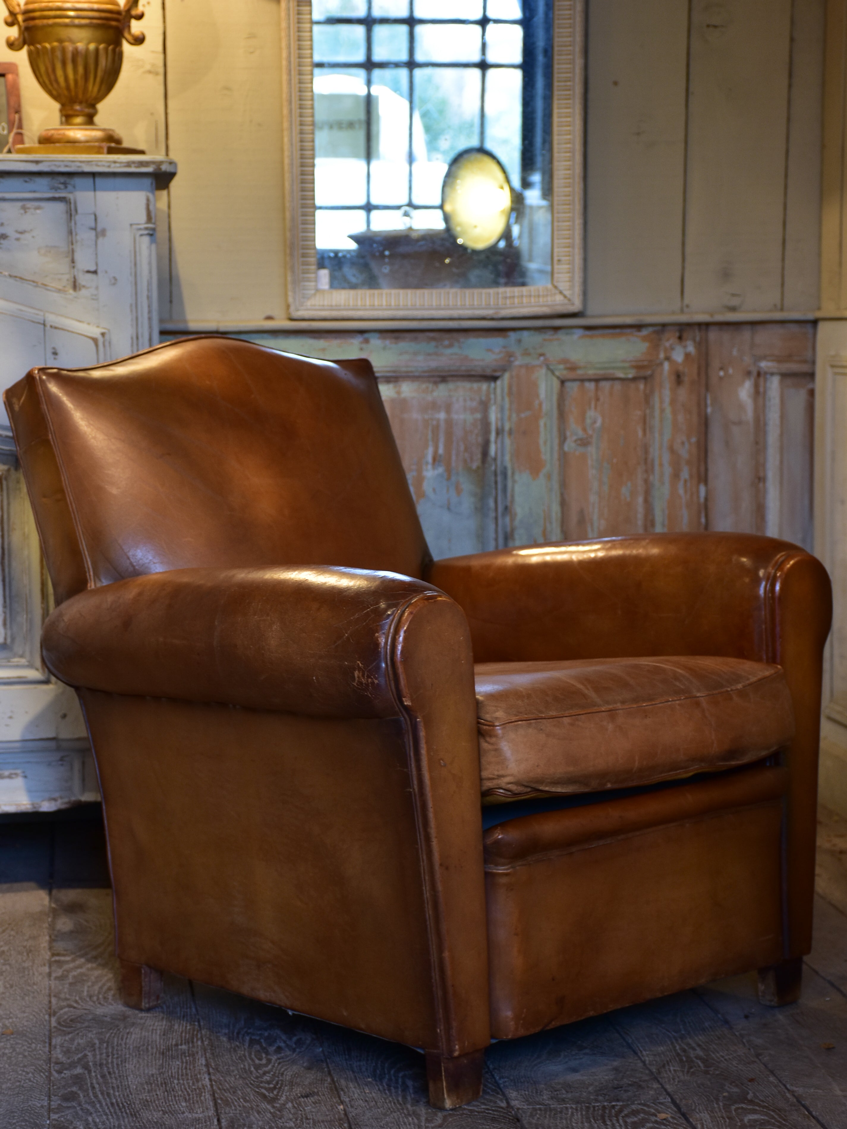 Vintage French leather club chair in original condition