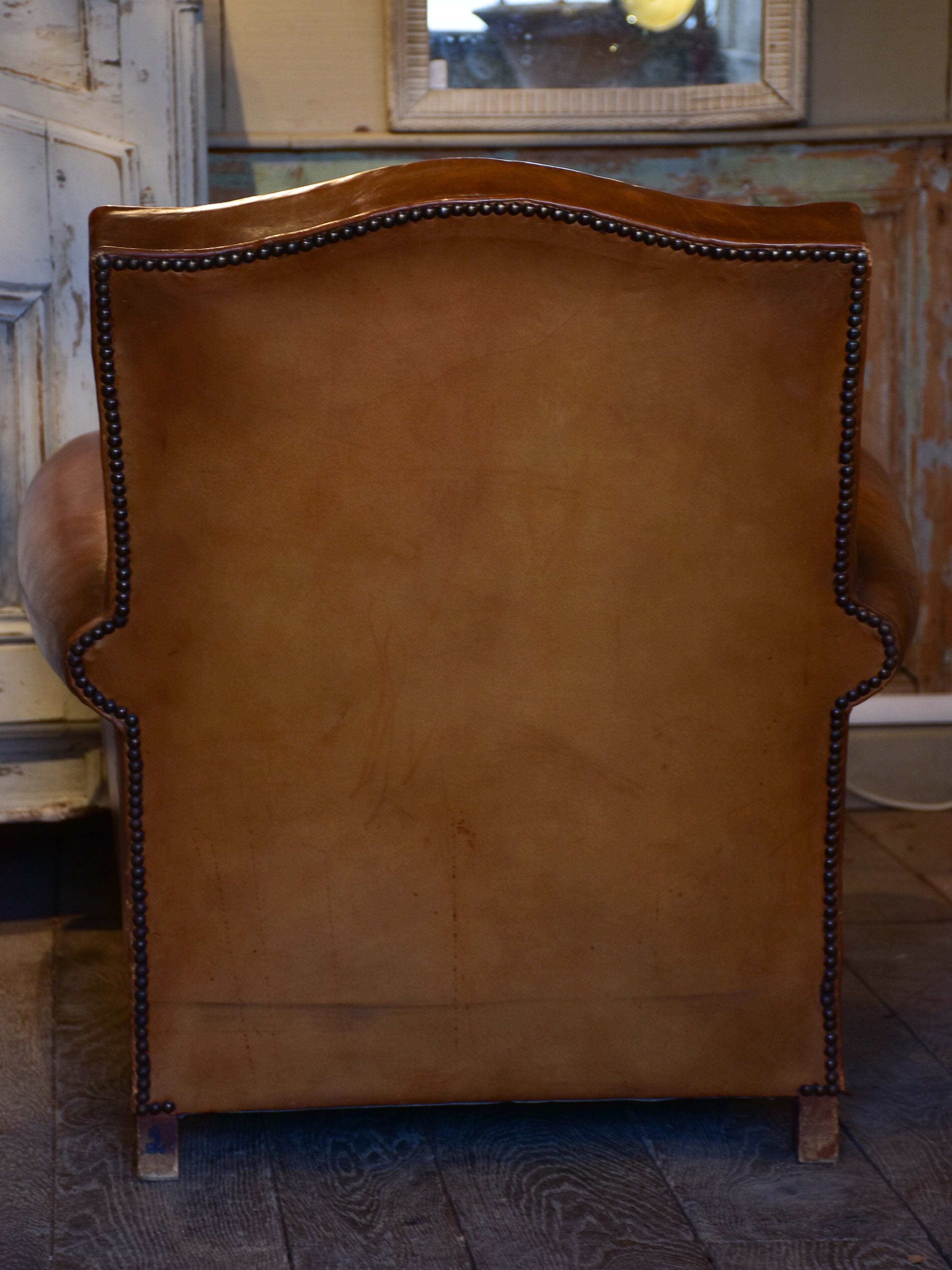 Vintage French leather club chair in original condition