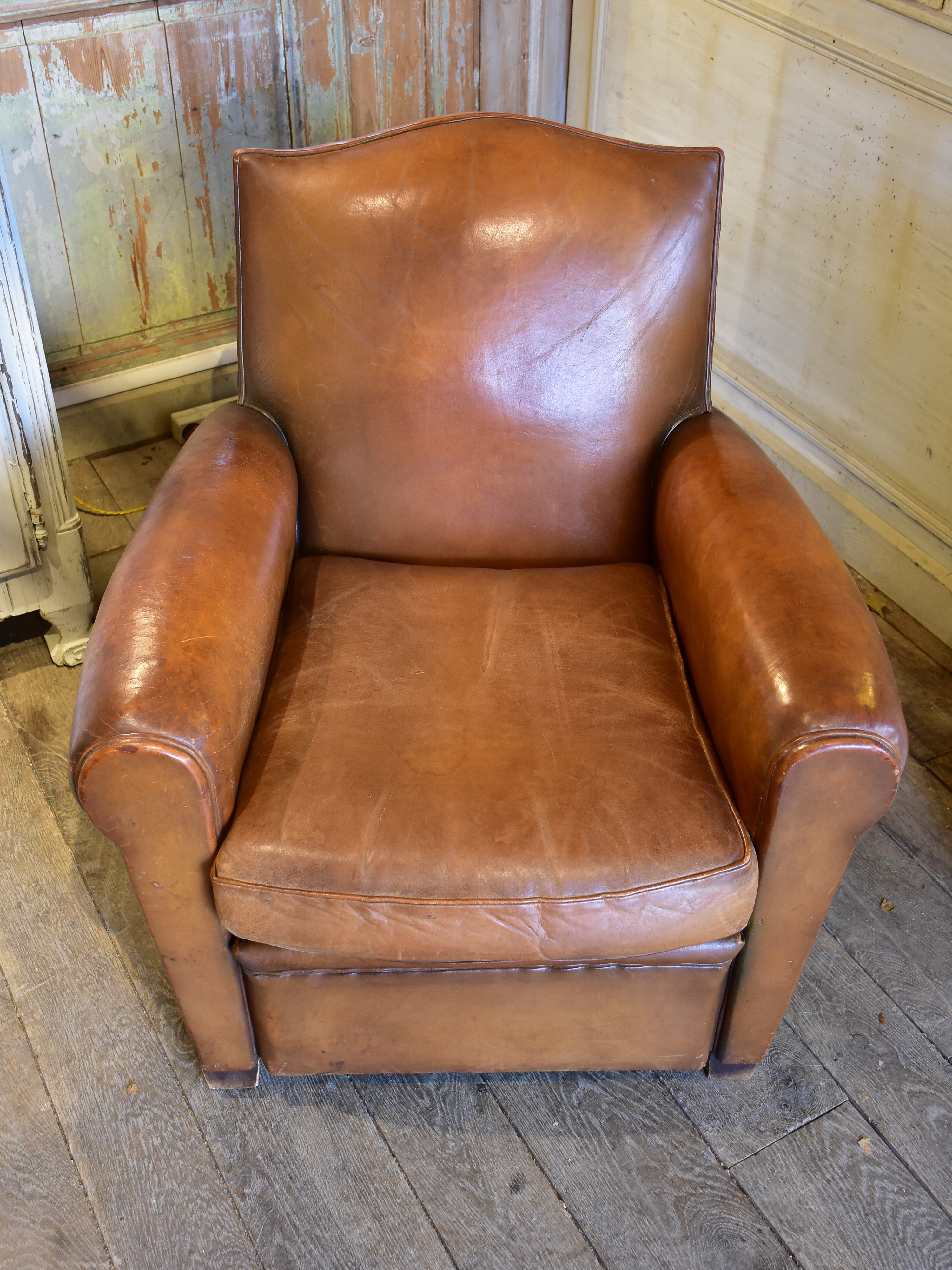 Vintage French leather club chair in original condition
