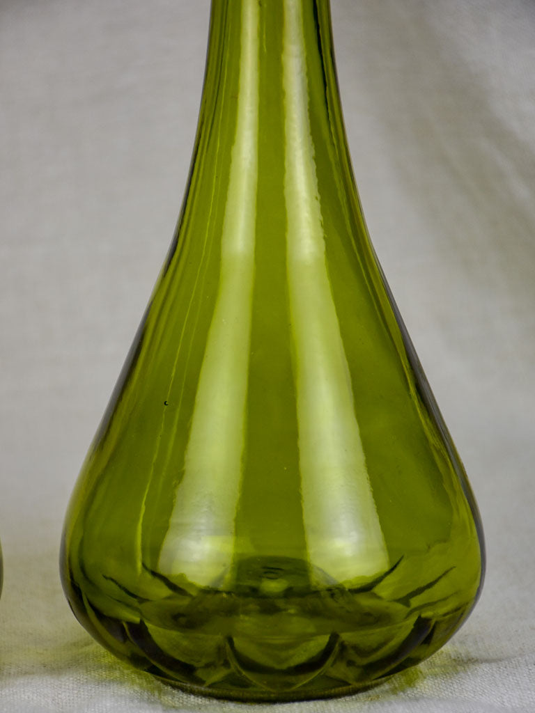 Old-world, olive-hued Italian glass carafes