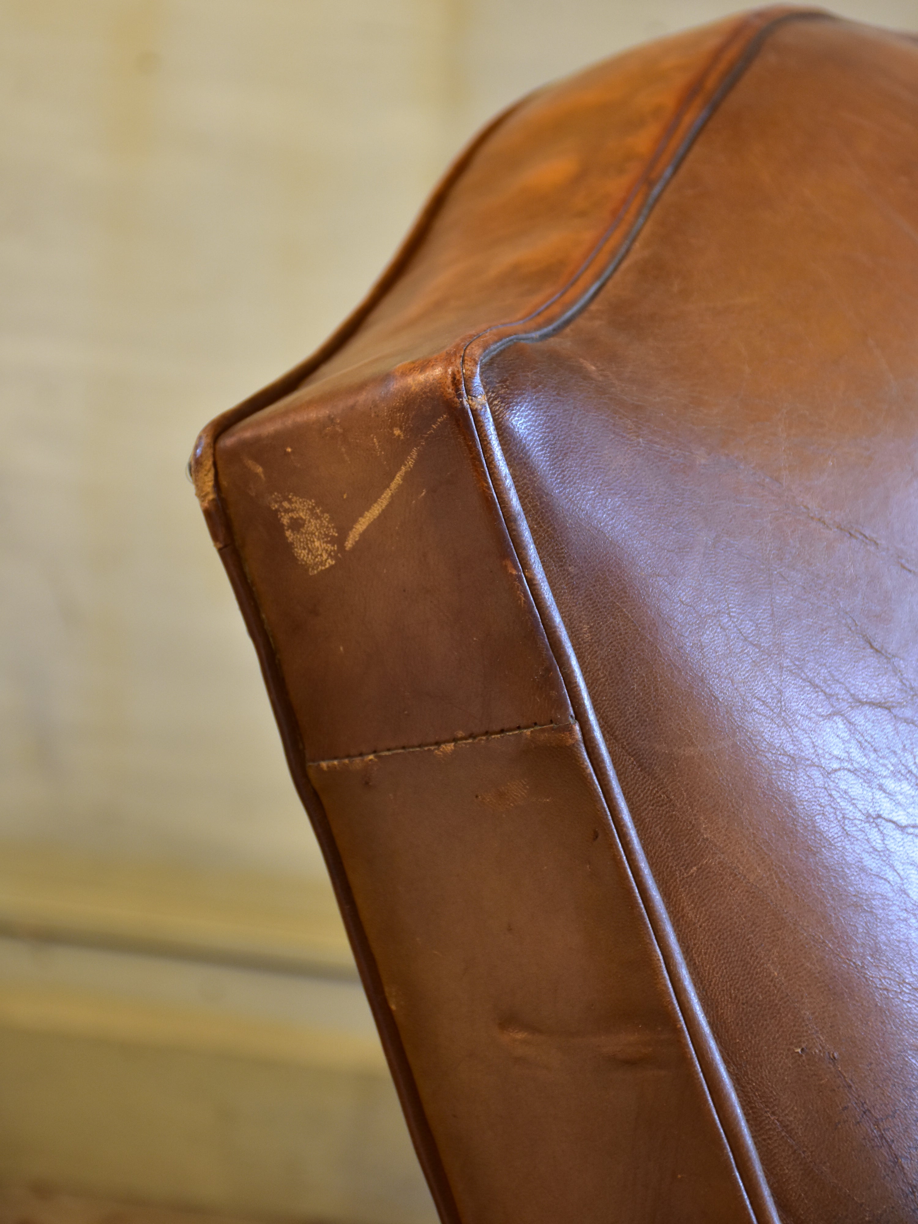 Vintage French leather club chair in original condition