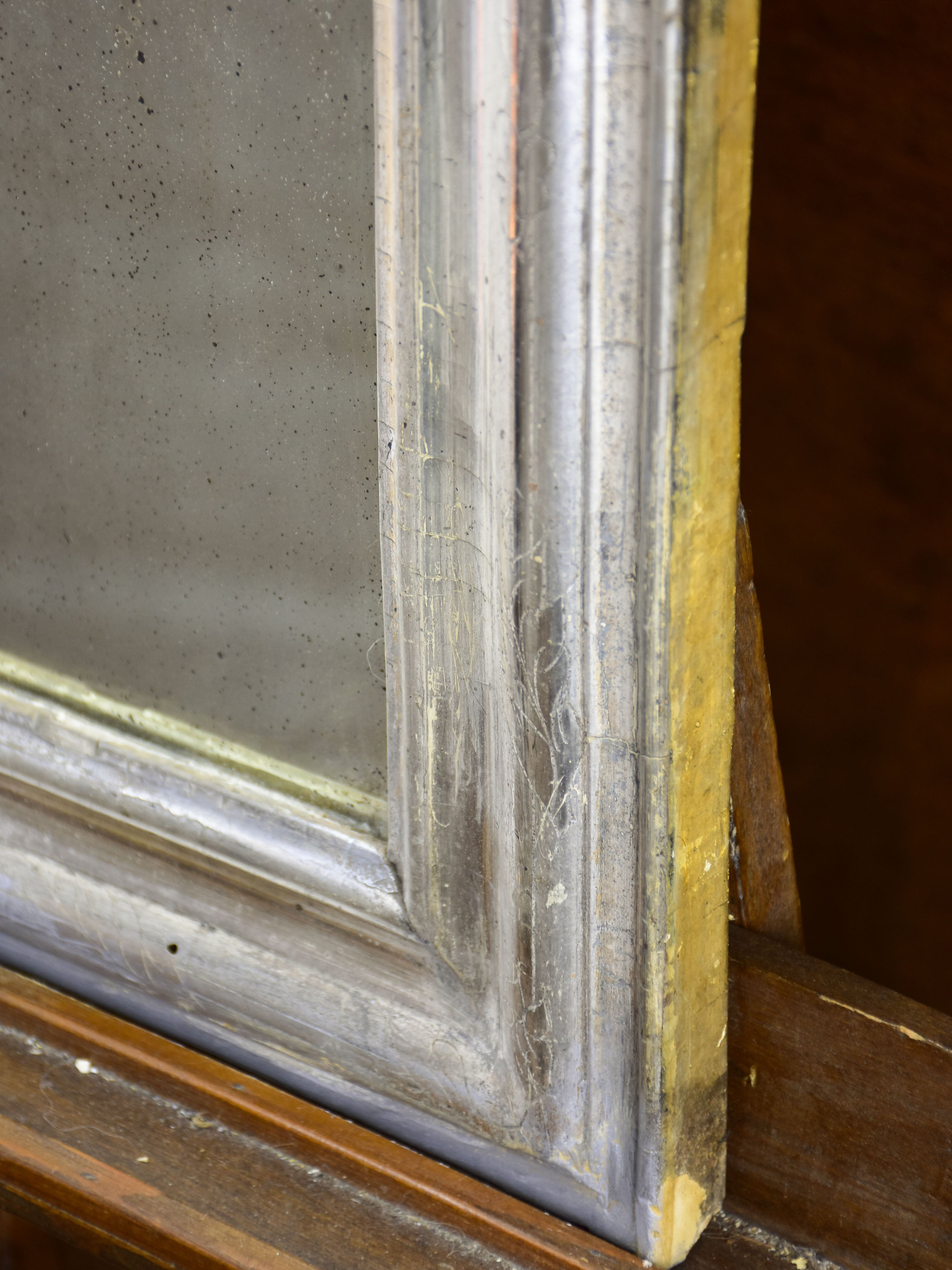 Small antique French Louis Philippe mirror with silver frame