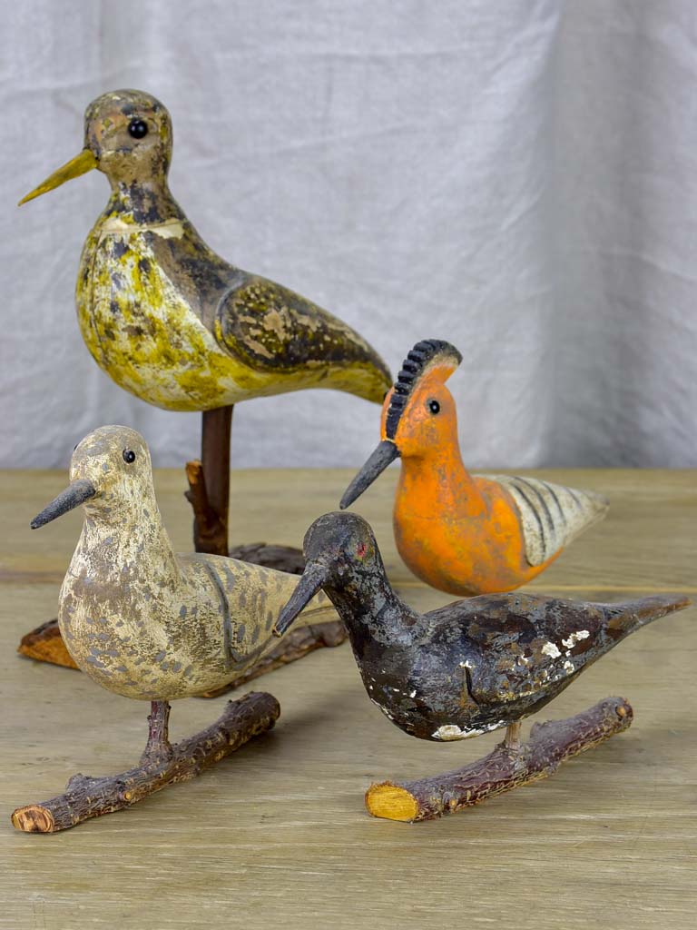 Collection of four antique carved wooden birds - late 19th / early 20th Century