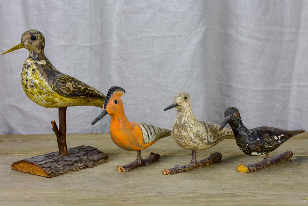 Collection of four antique carved wooden birds - late 19th / early 20th Century