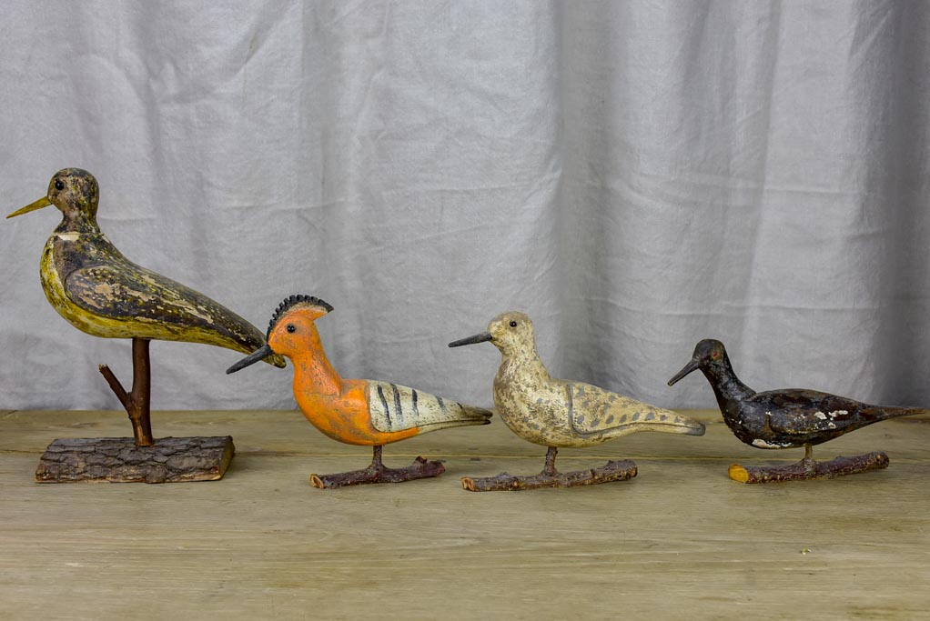 Collection of four antique carved wooden birds - late 19th / early 20th Century