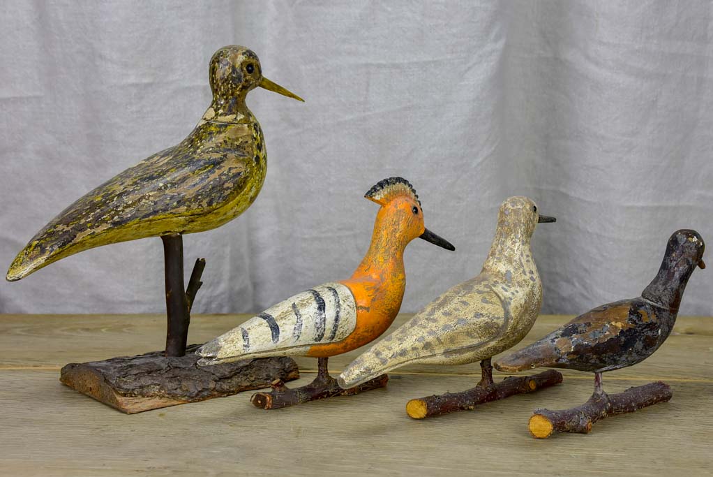 Collection of four antique carved wooden birds - late 19th / early 20th Century