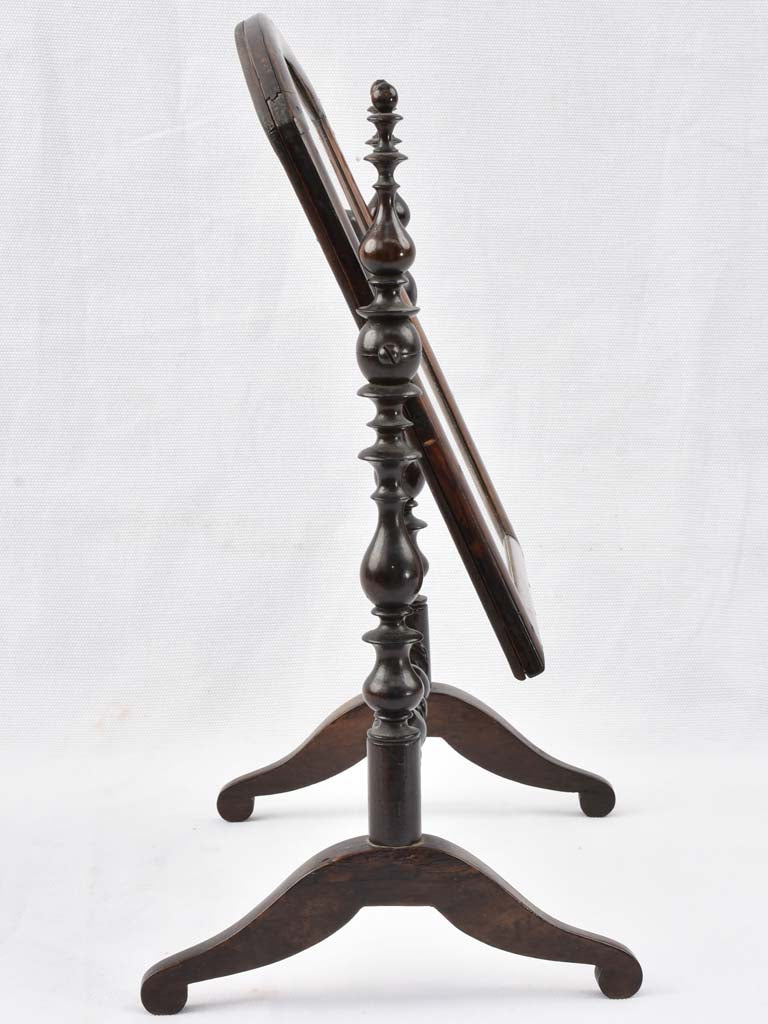 Antiquarian walnut made tilting mirror
