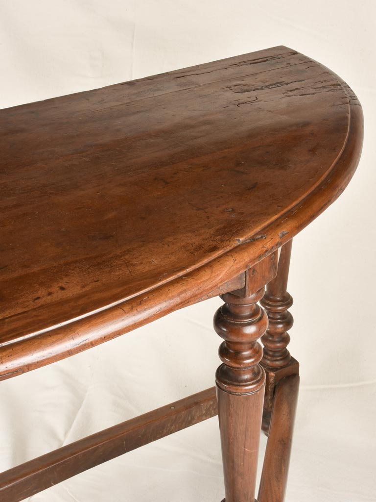 Pair of demi-lune console tables 60¾"