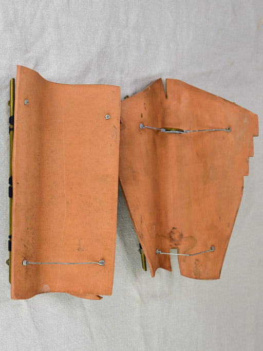 Pair of vintage handmade terracotta tile wall sconces with faces 11¾"
