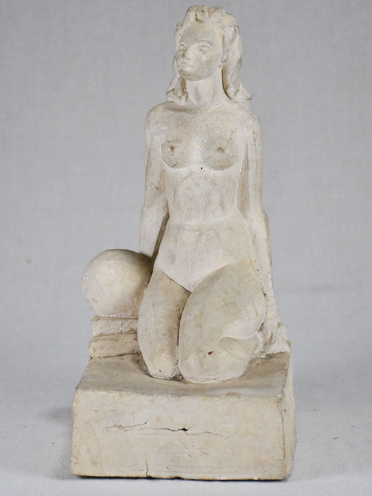 1940's plaster sculpture of a lady and a ball 12¼"