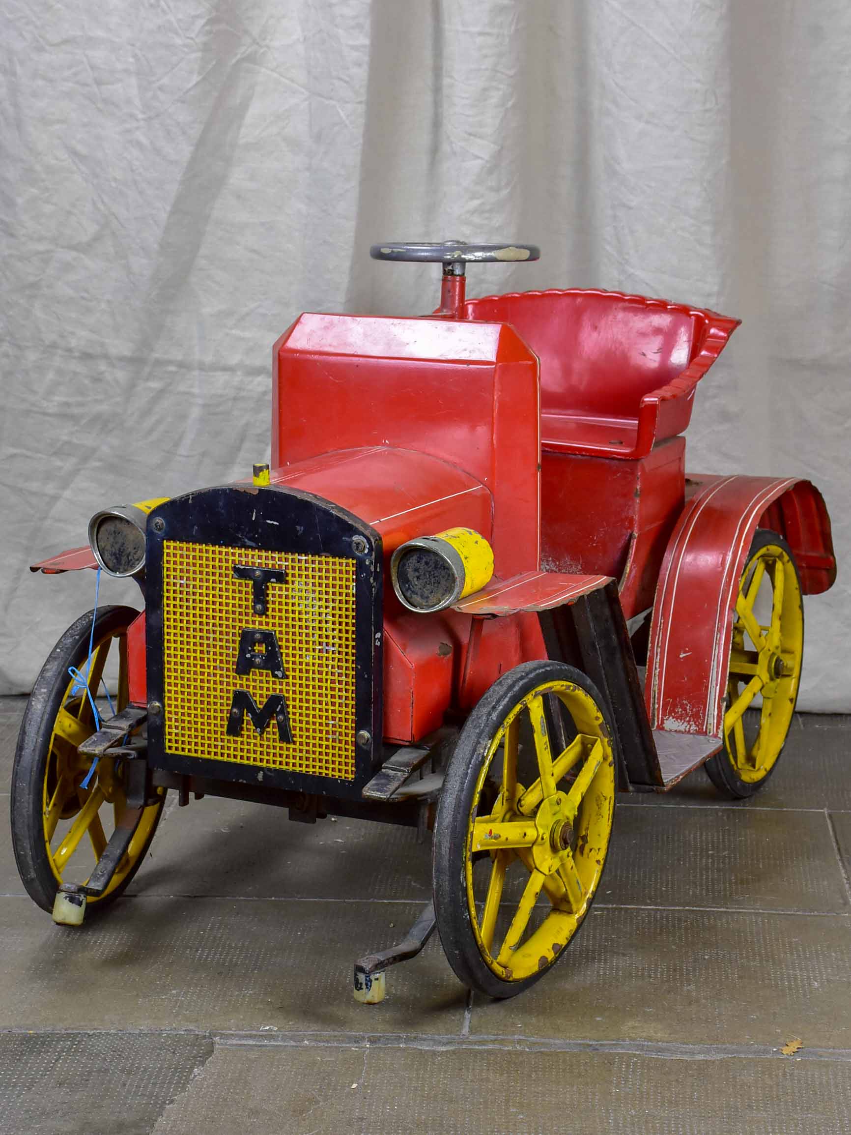 Mid-century Swiss carousel toy car - red TAM
