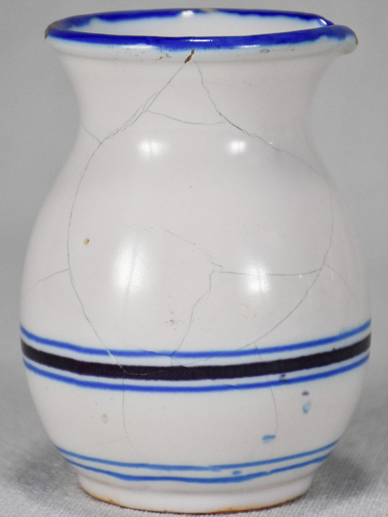 Collection of eight 19th-century white pots with blue stripes from Sète