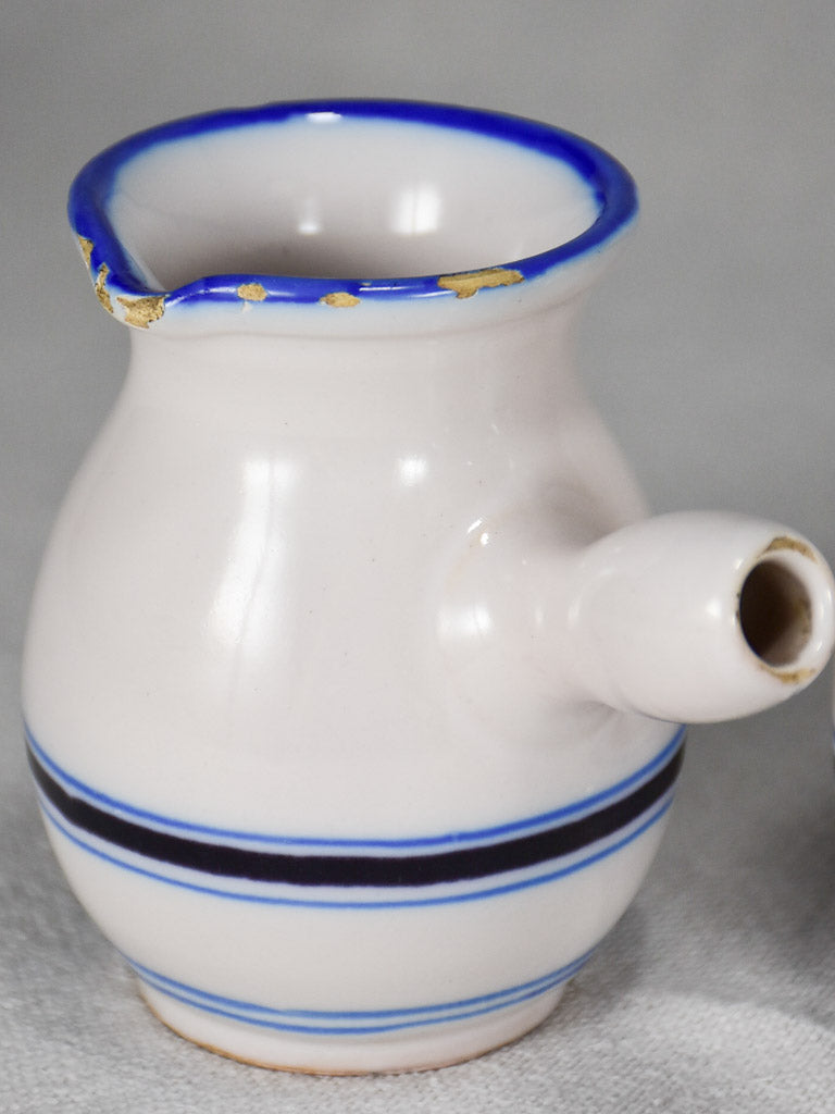 Collection of eight 19th-century white pots with blue stripes from Sète