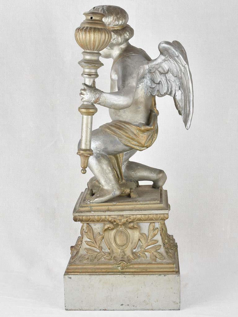 Nineteenth-century zinc cherub on cushion