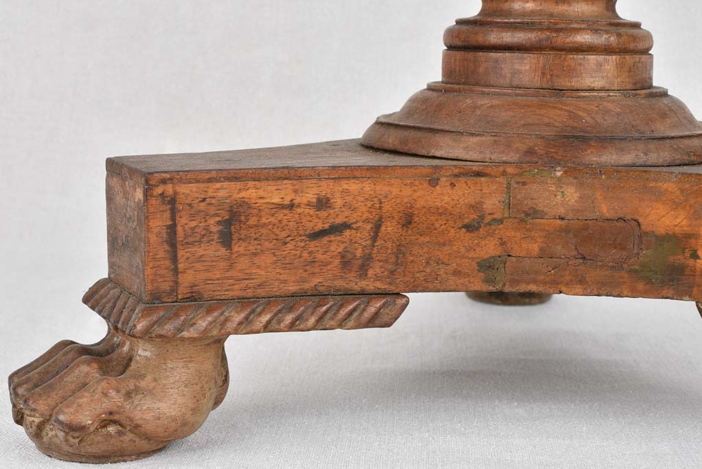 19th century French round side table with lion's paw feet
