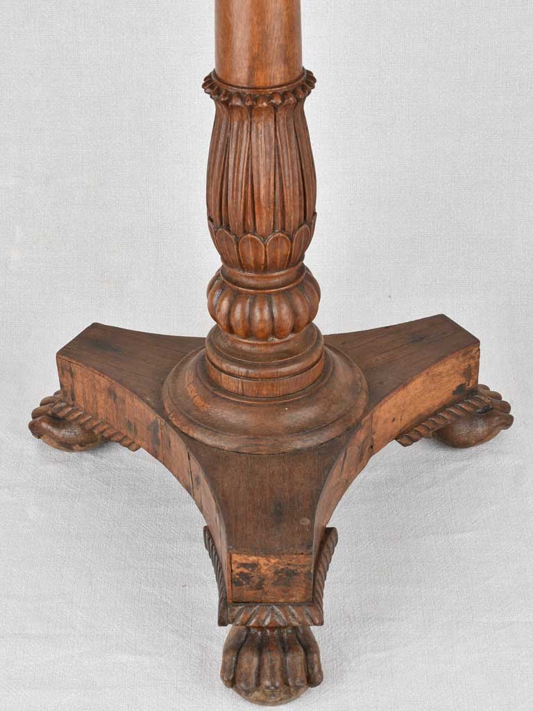 19th century French round side table with lion's paw feet