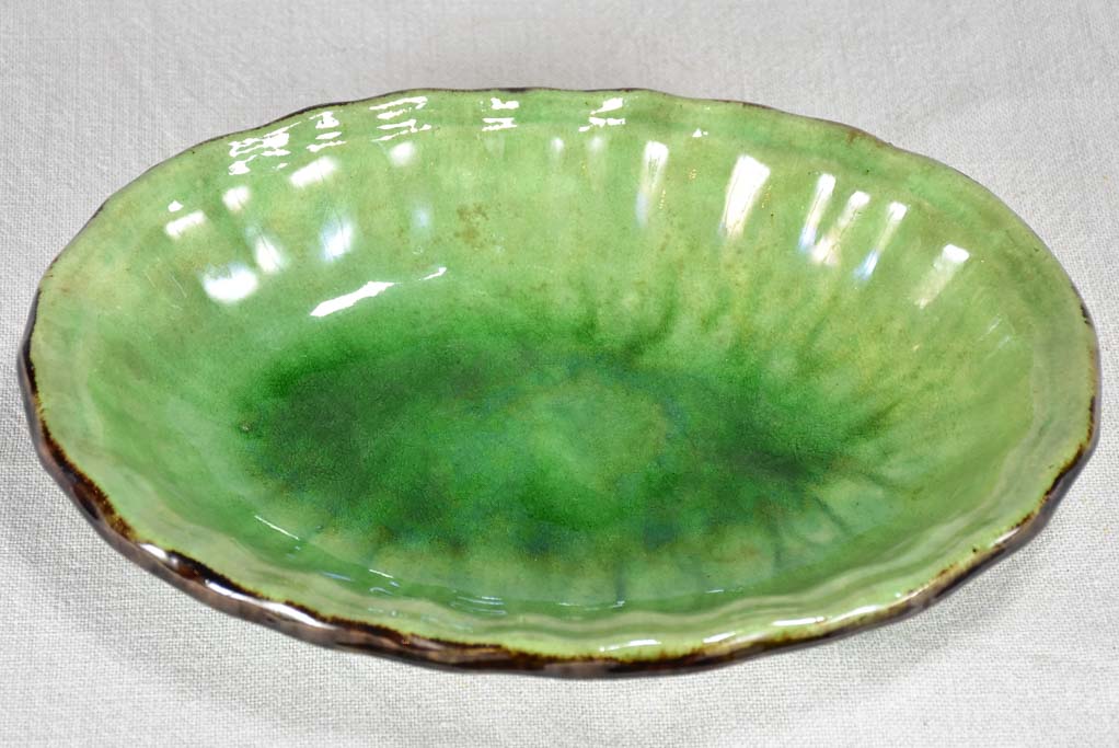 Antique French oval bowl from Dieulefit with green glaze 11"