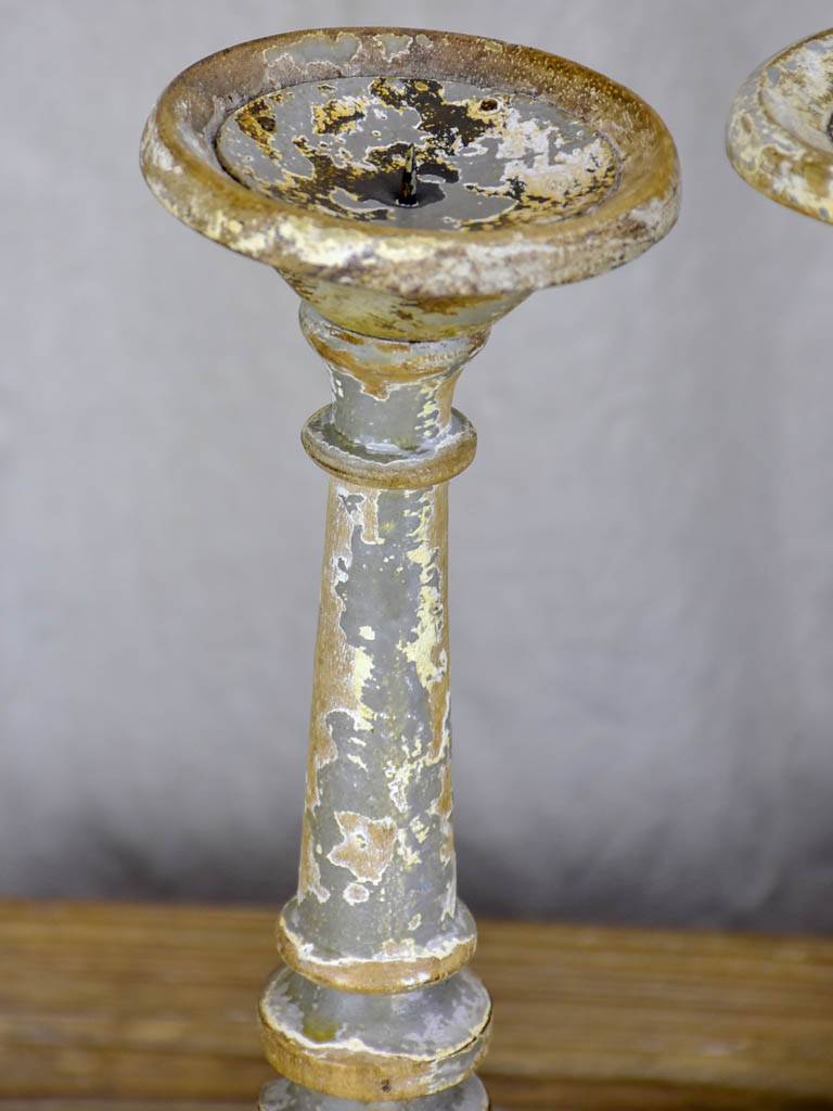 Collection of four rustic vintage candlesticks