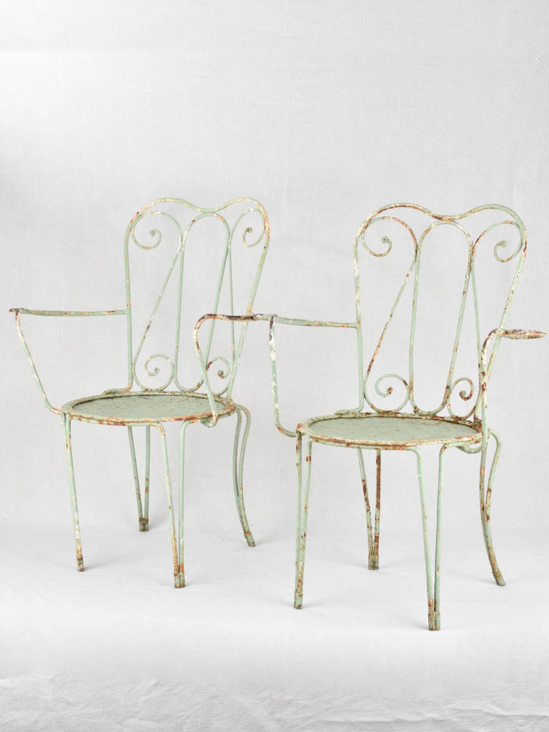 Pair of 1950s garden armchairs with green patina