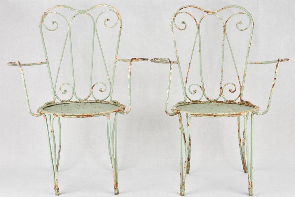 Pair of 1950s garden armchairs with green patina