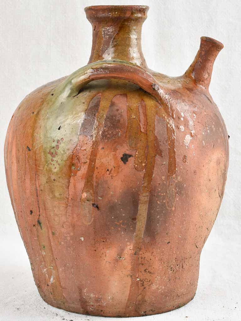 Antique French walnut oil pitcher from the Auvergne w/ brown glaze 13¾"