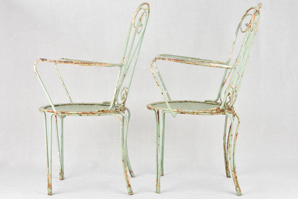 Pair of 1950s garden armchairs with green patina