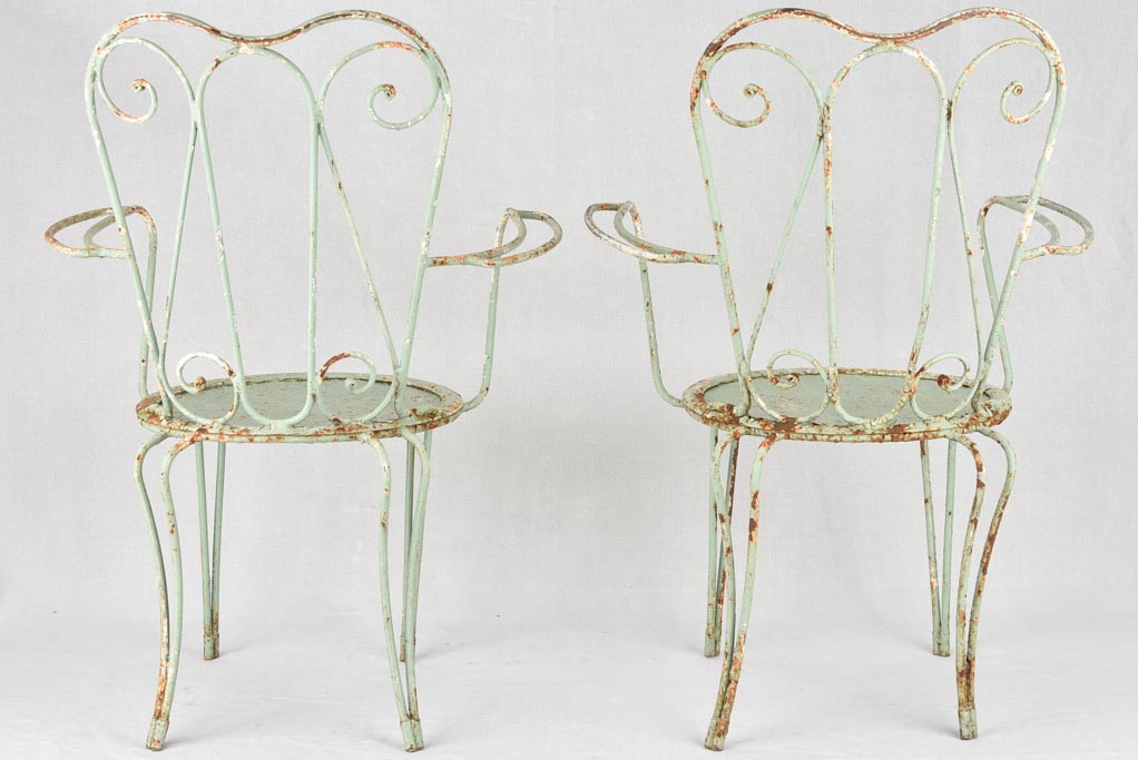 Pair of 1950s garden armchairs with green patina