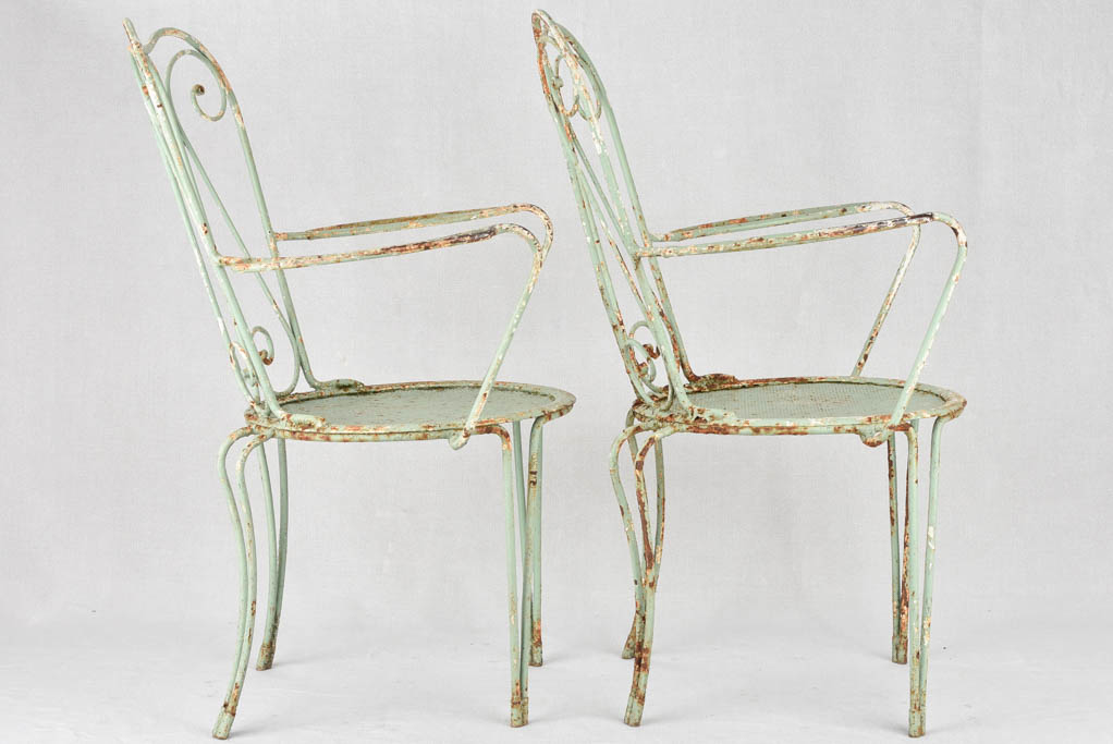 Pair of 1950s garden armchairs with green patina