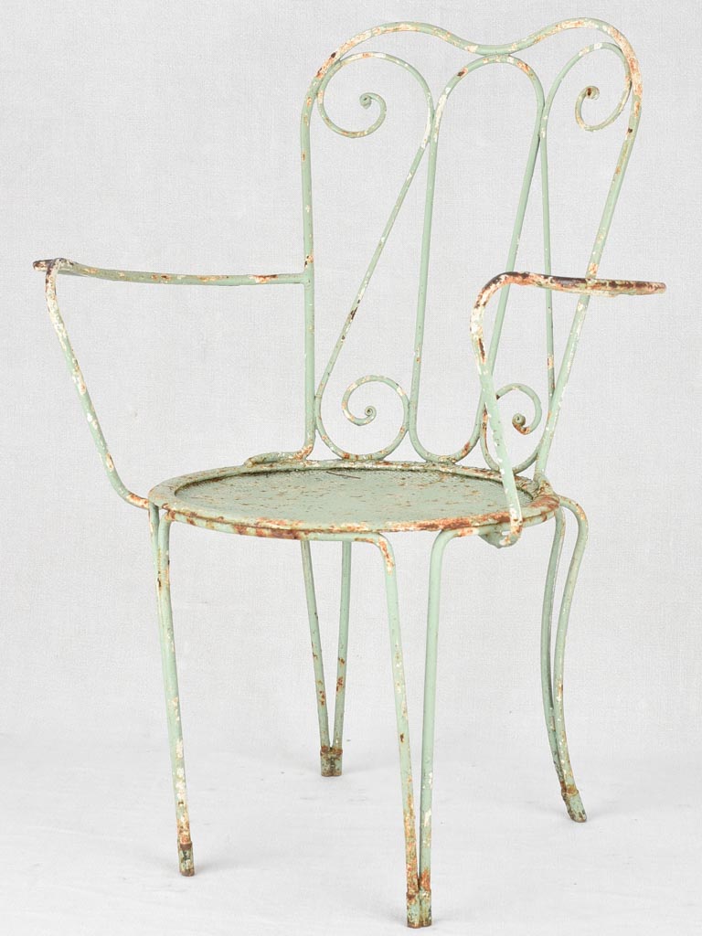 Pair of 1950s garden armchairs with green patina