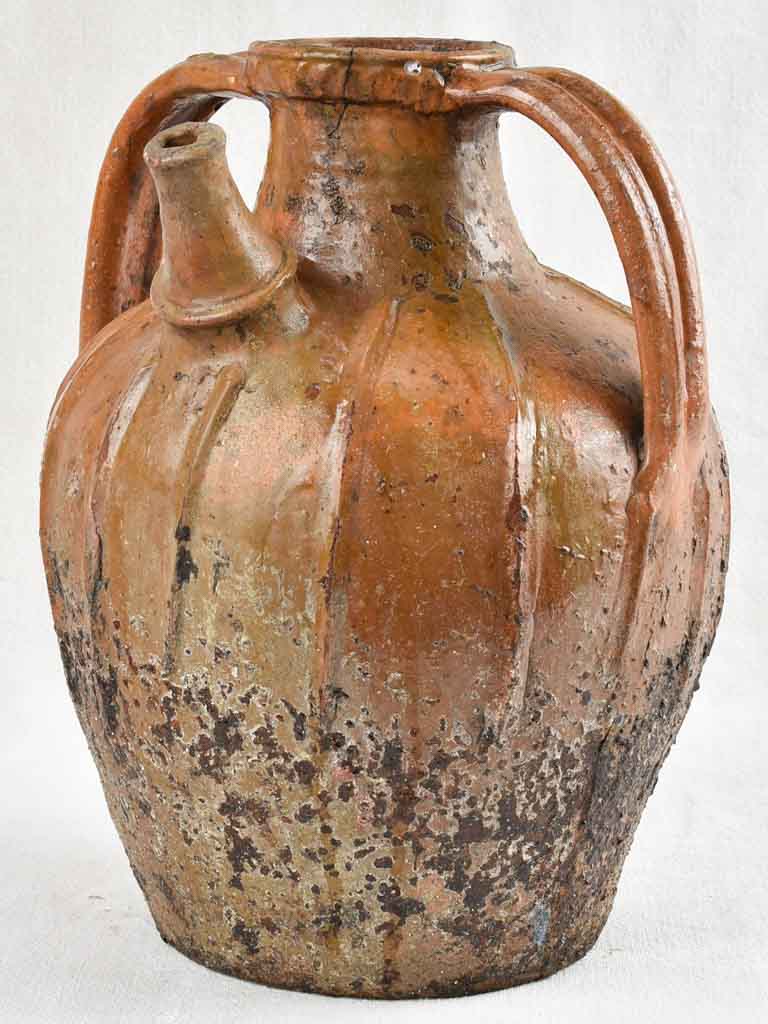 Antique French terracotta walnut oil pitcher from the Auvergne 14¼"