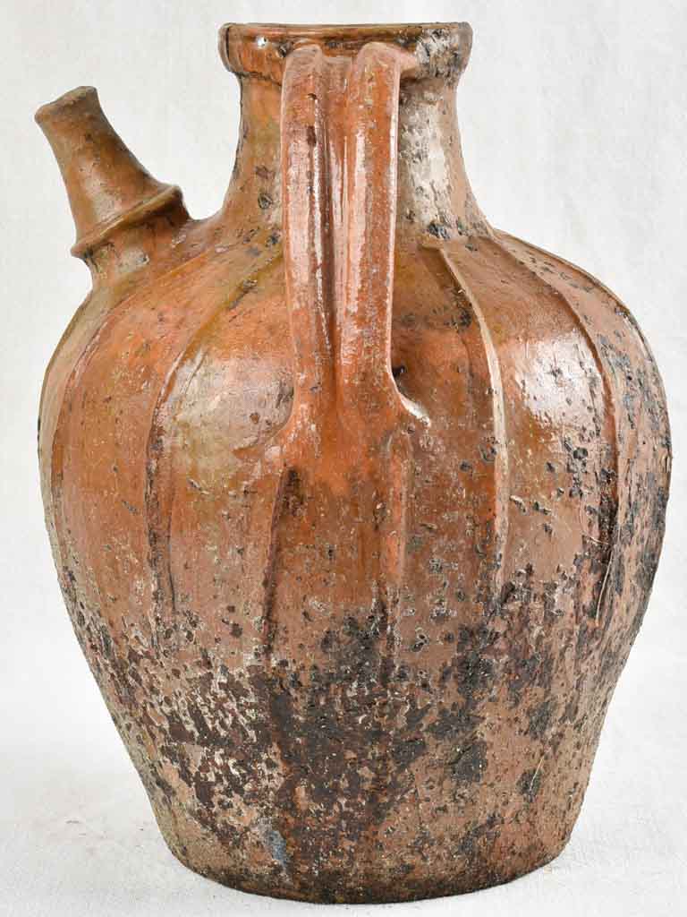 Antique French terracotta walnut oil pitcher from the Auvergne 14¼"