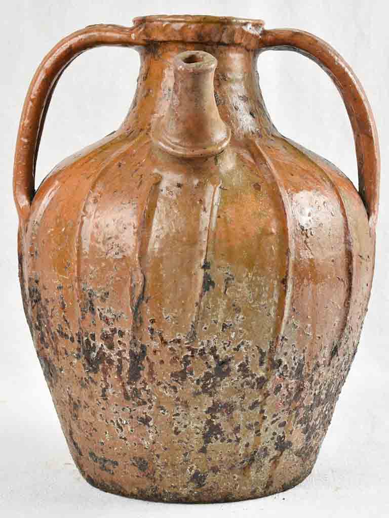 Antique French terracotta walnut oil pitcher from the Auvergne 14¼"