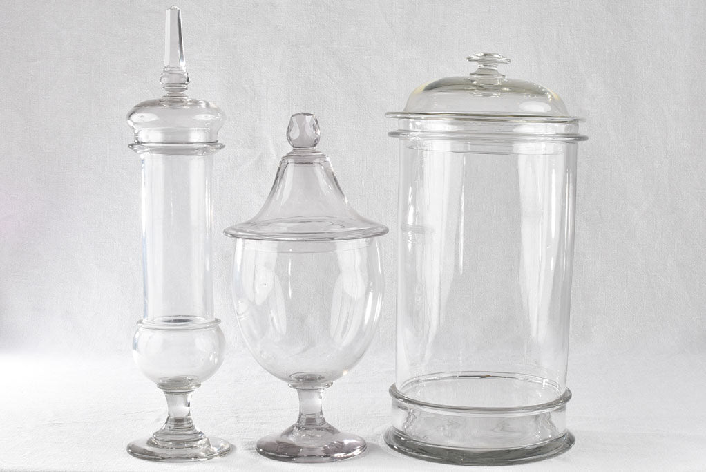 Collection of three lidded blown glass jars 19th century 21¾"