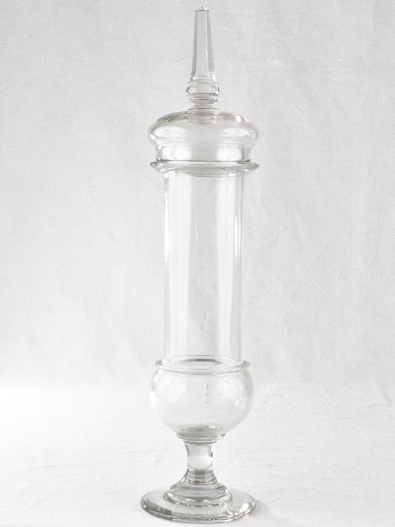 Collection of three lidded blown glass jars 19th century 21¾"