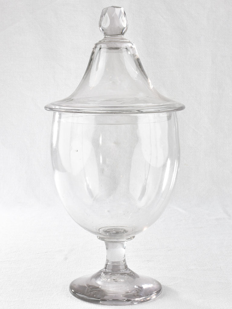 Collection of three lidded blown glass jars 19th century 21¾"