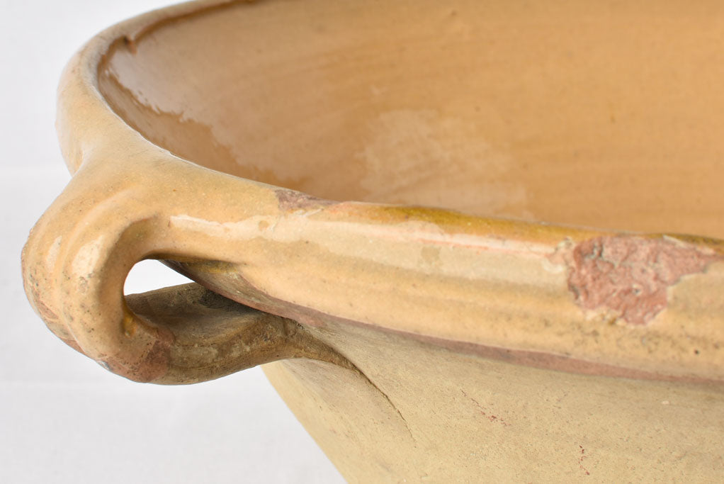 Shiny yellow glazed ceramic tian