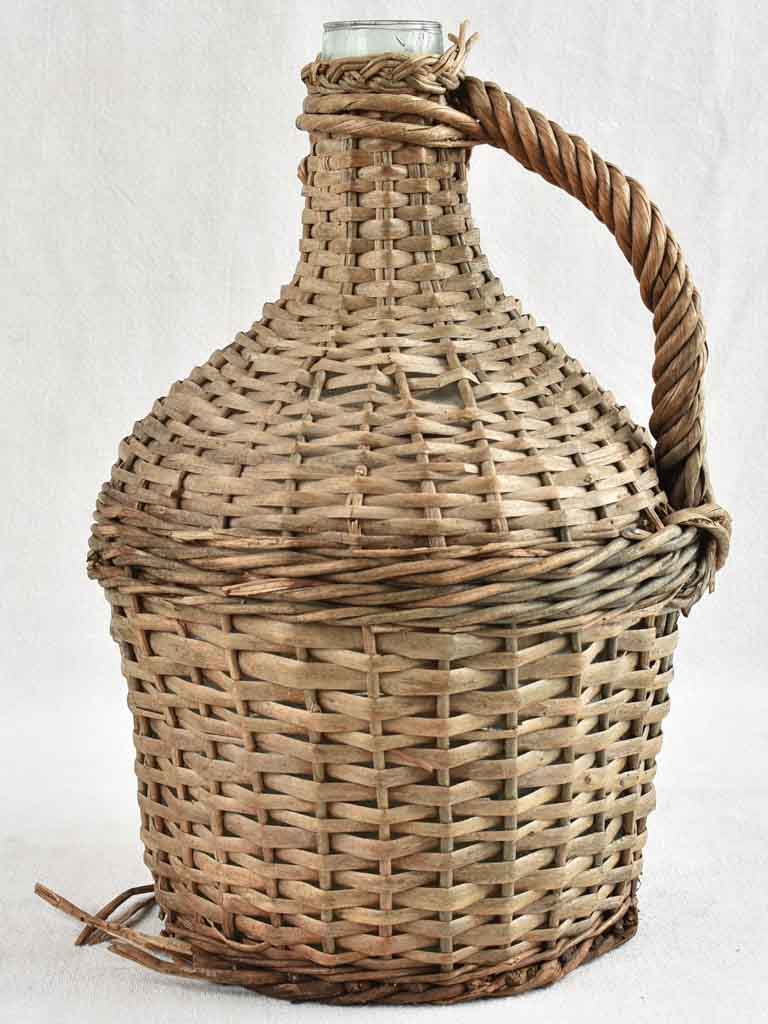 Vintage French demijohn bottle in wicker case 13¾"