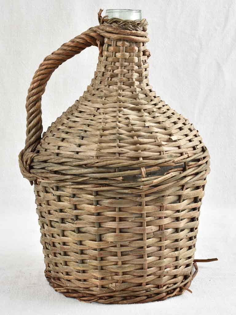 Vintage French demijohn bottle in wicker case 13¾"