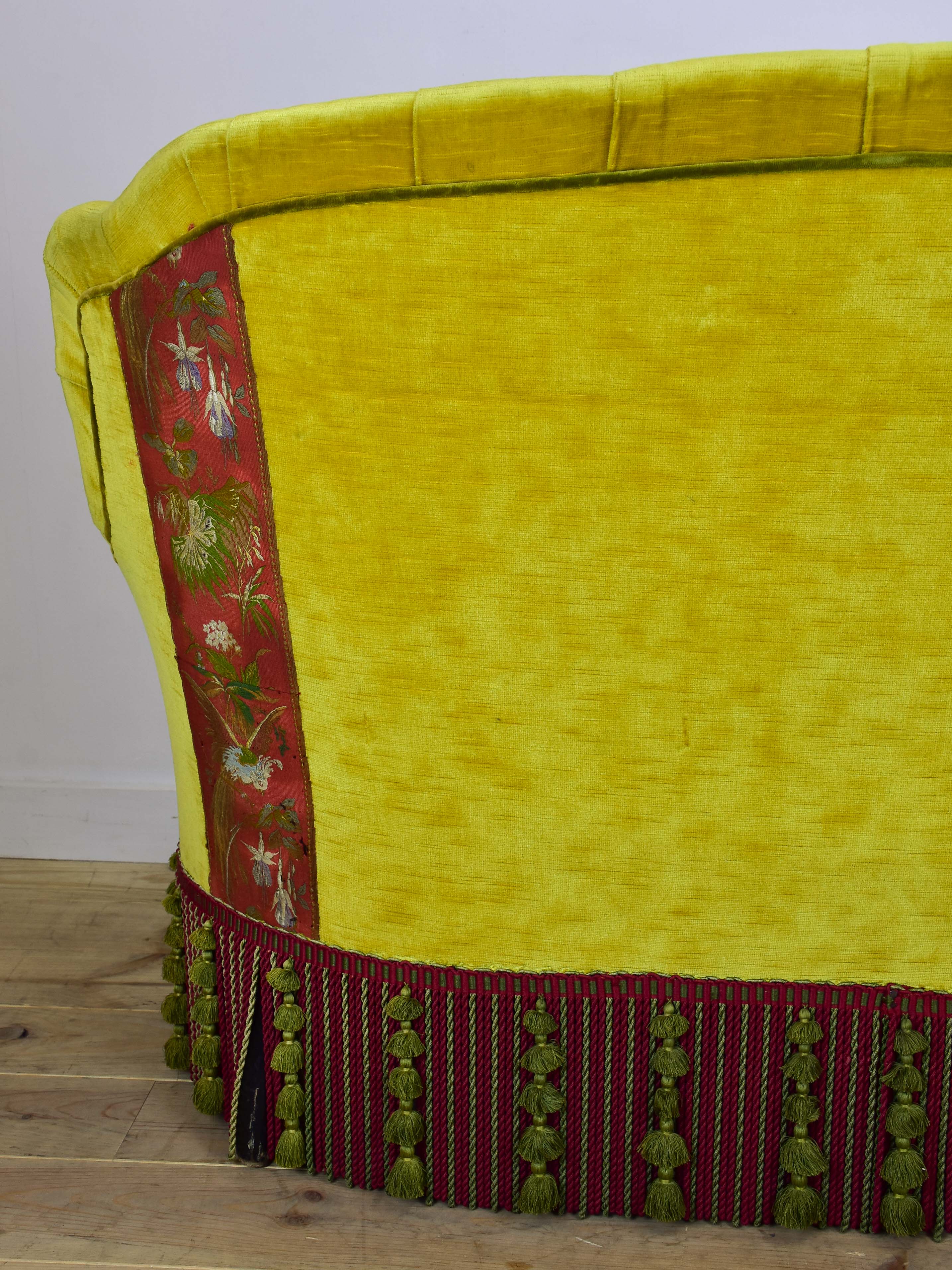 Naooleon III sofa with yellow and pink upholstery and fringe