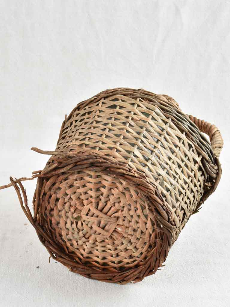 Vintage French demijohn bottle in wicker case 13¾"