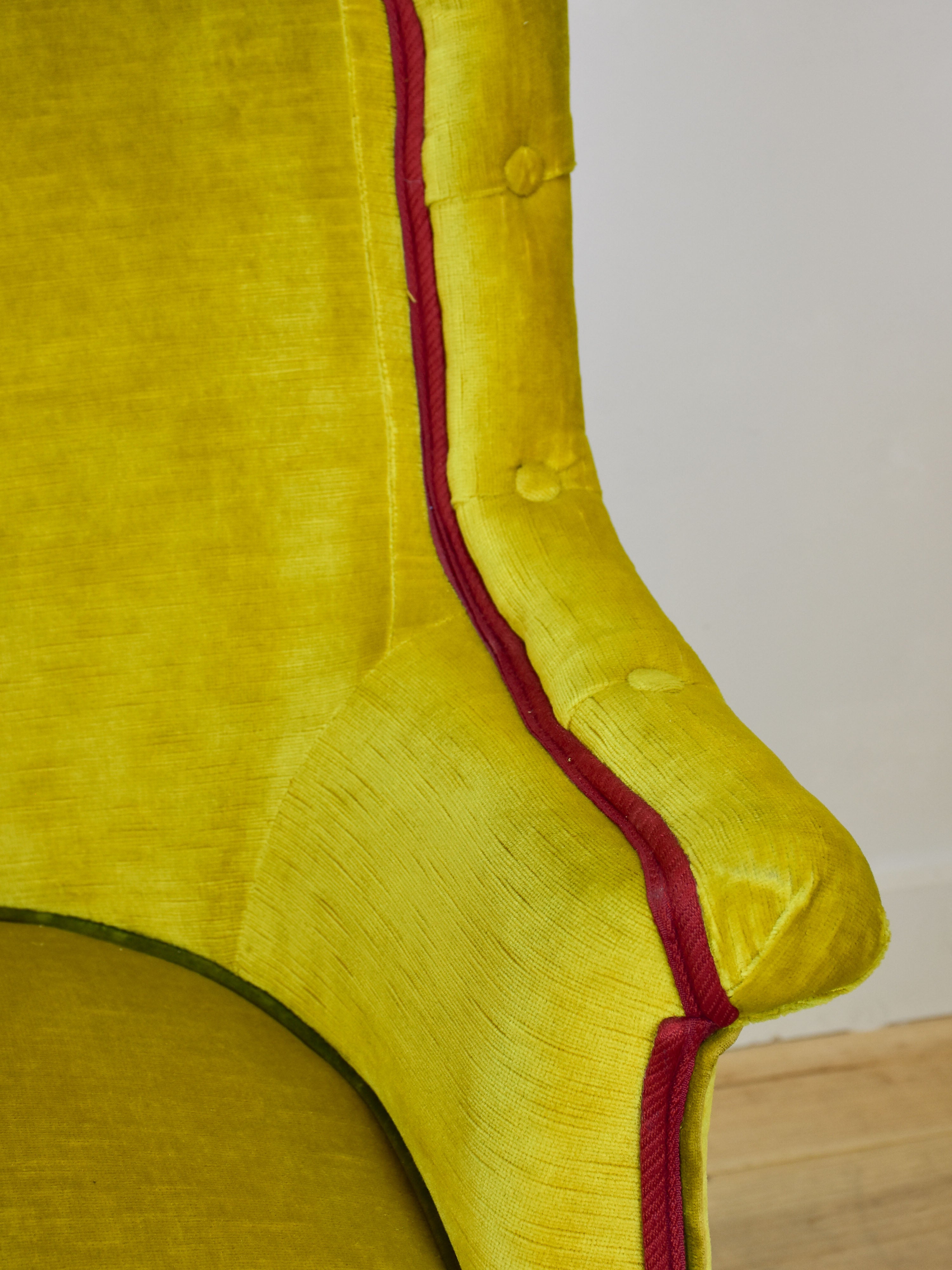 Naooleon III sofa with yellow and pink upholstery and fringe