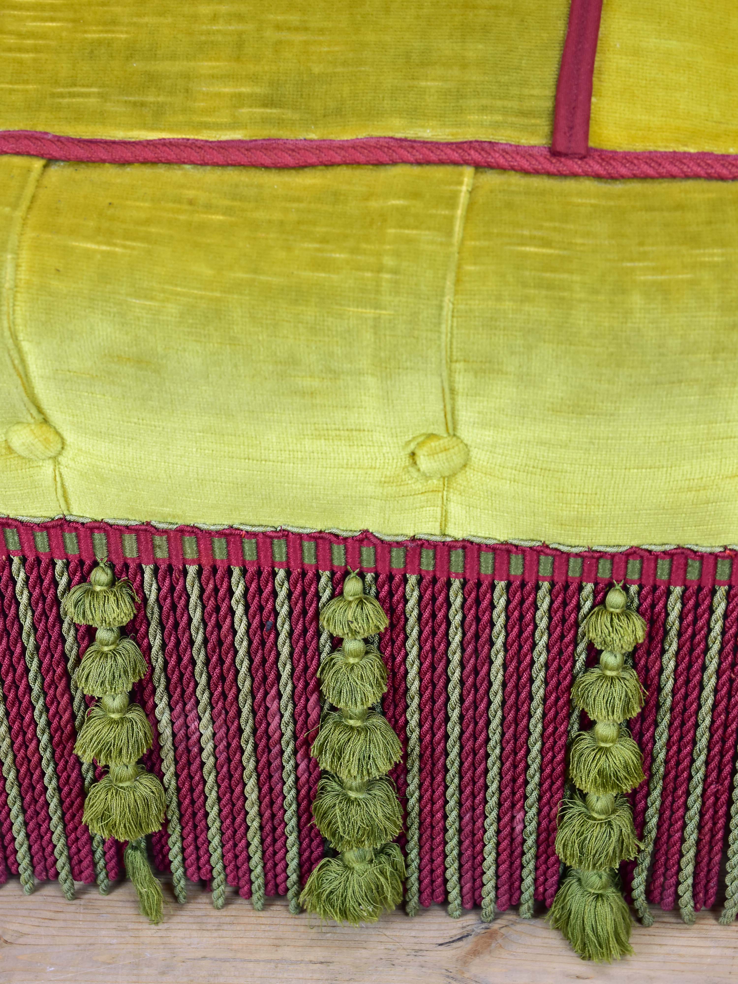 Naooleon III sofa with yellow and pink upholstery and fringe