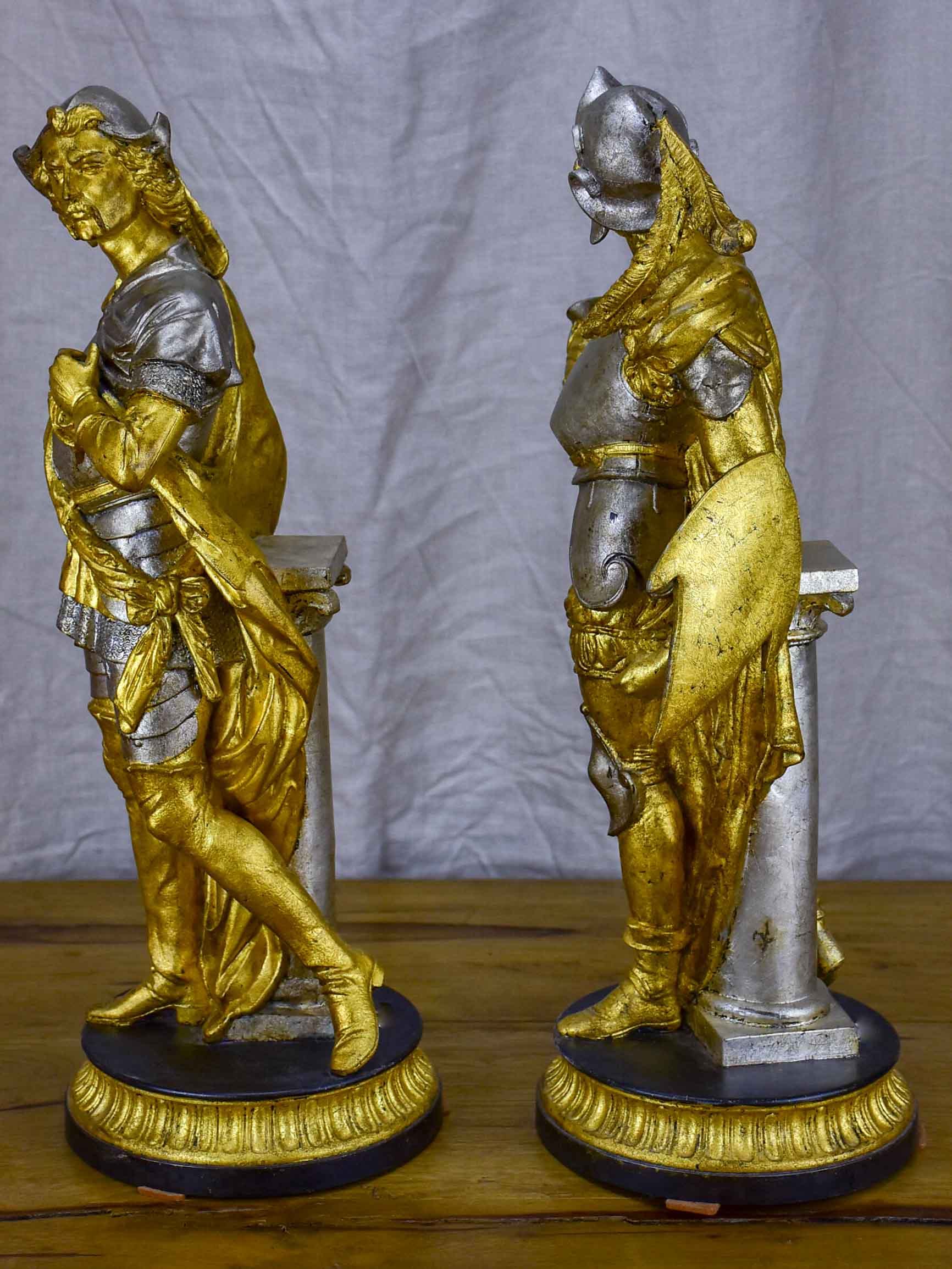 Pair of late 19th Century silver and gold statues
