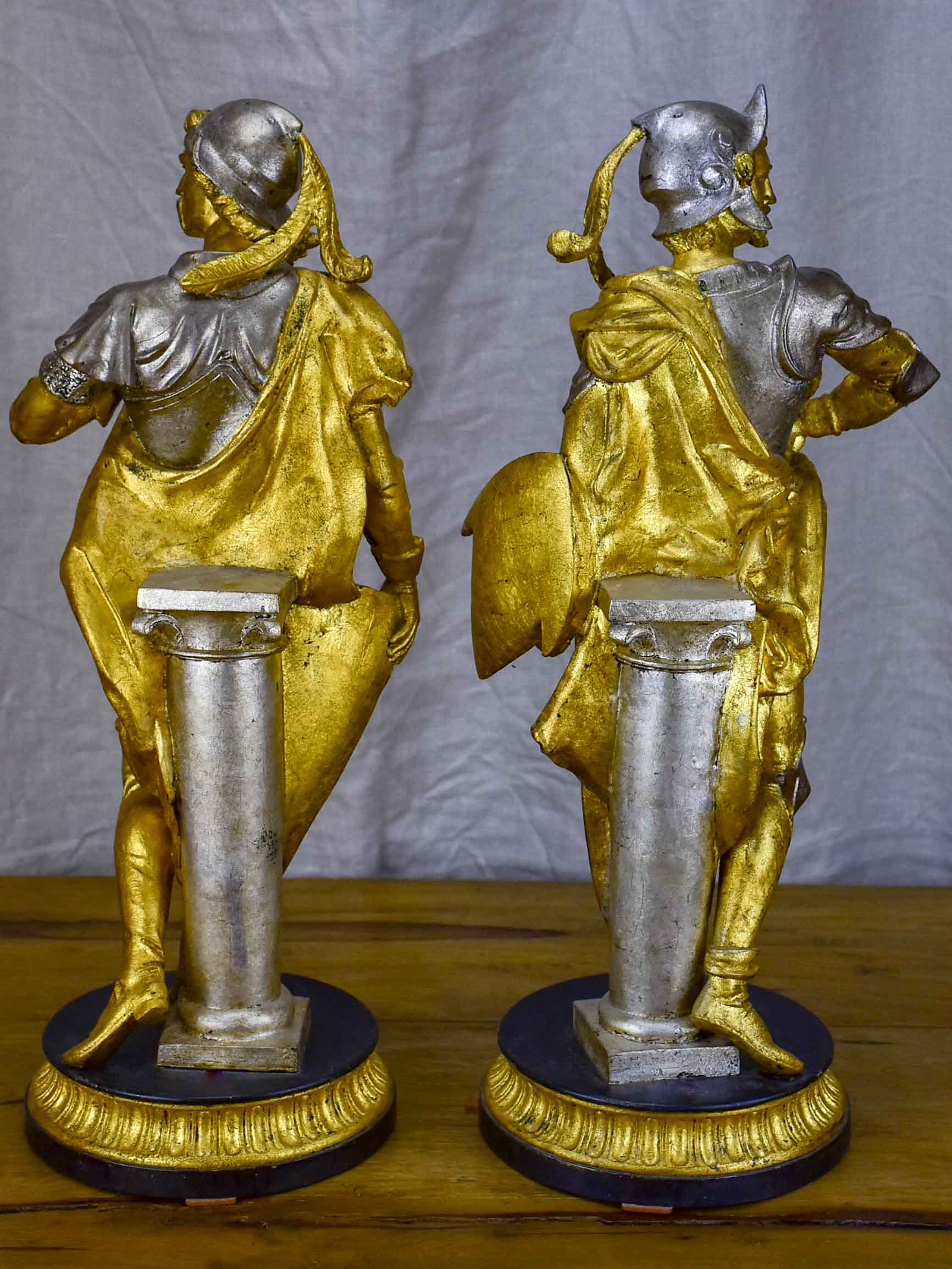 Pair of late 19th Century silver and gold statues