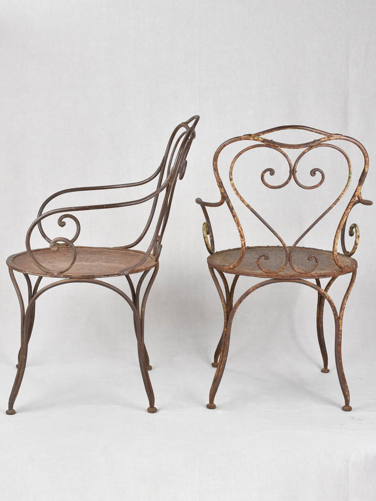 Pair of 19th century garden armchairs
