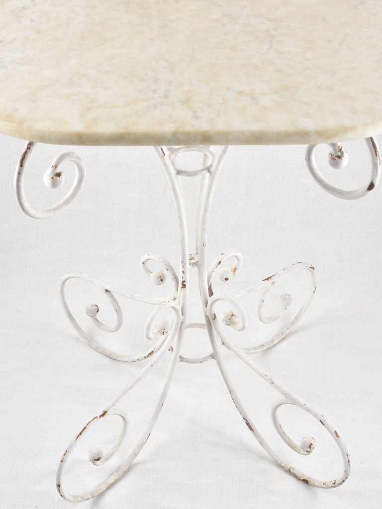 Oval marble garden table with wrought iron base 19¼" x 27½"