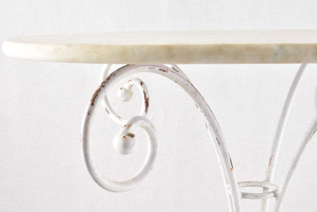 Oval marble garden table with wrought iron base 19¼" x 27½"