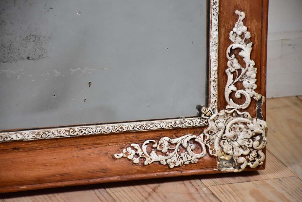 French mirror with stucco decorations