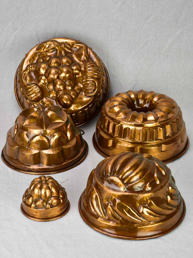 Collection of five late 18th / early 19th century copper cake molds